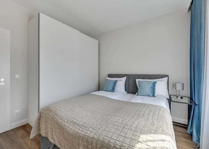 Апартаменты Scala Center & By Lion